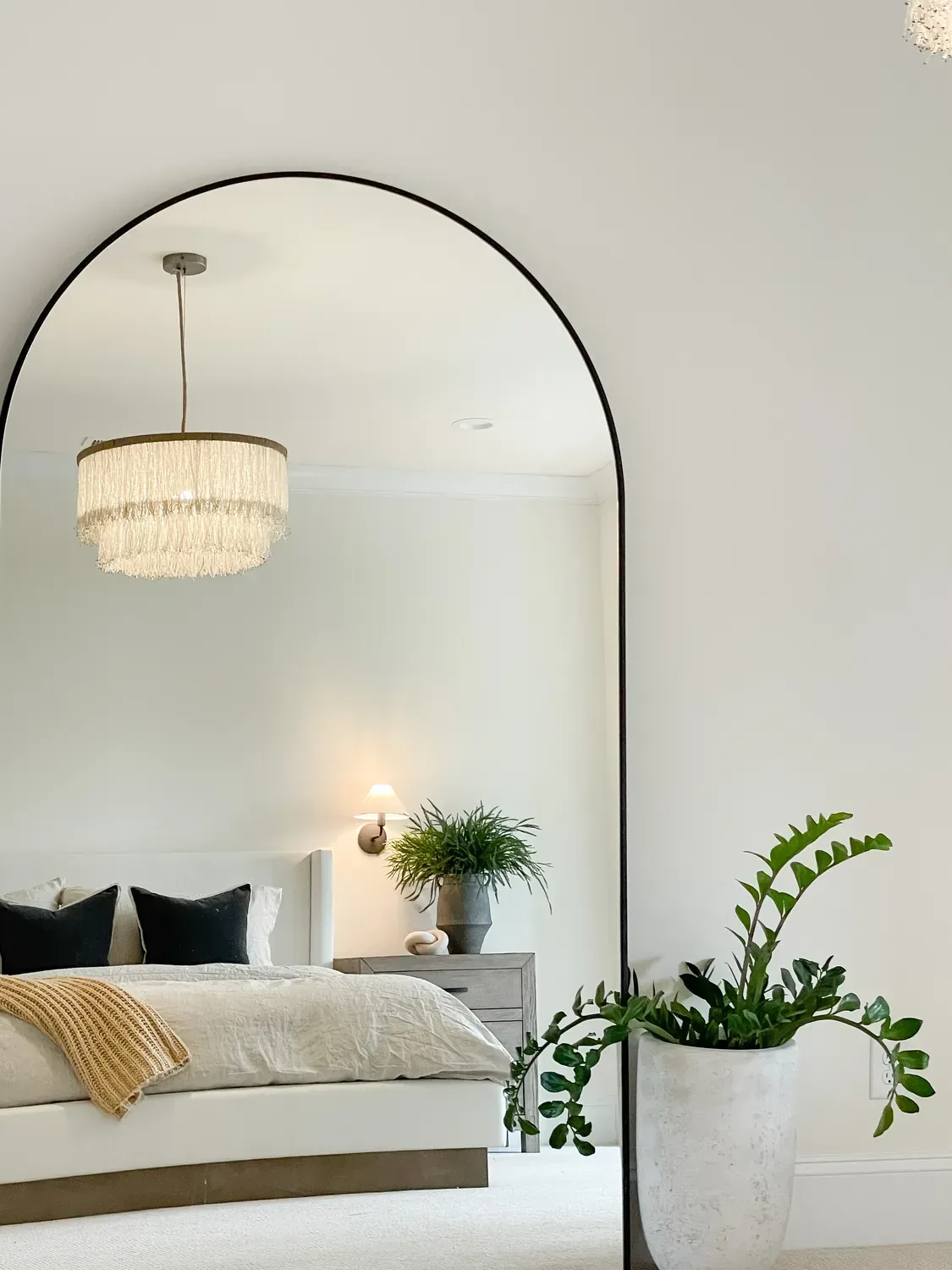 arched mirror bedroom decor idea