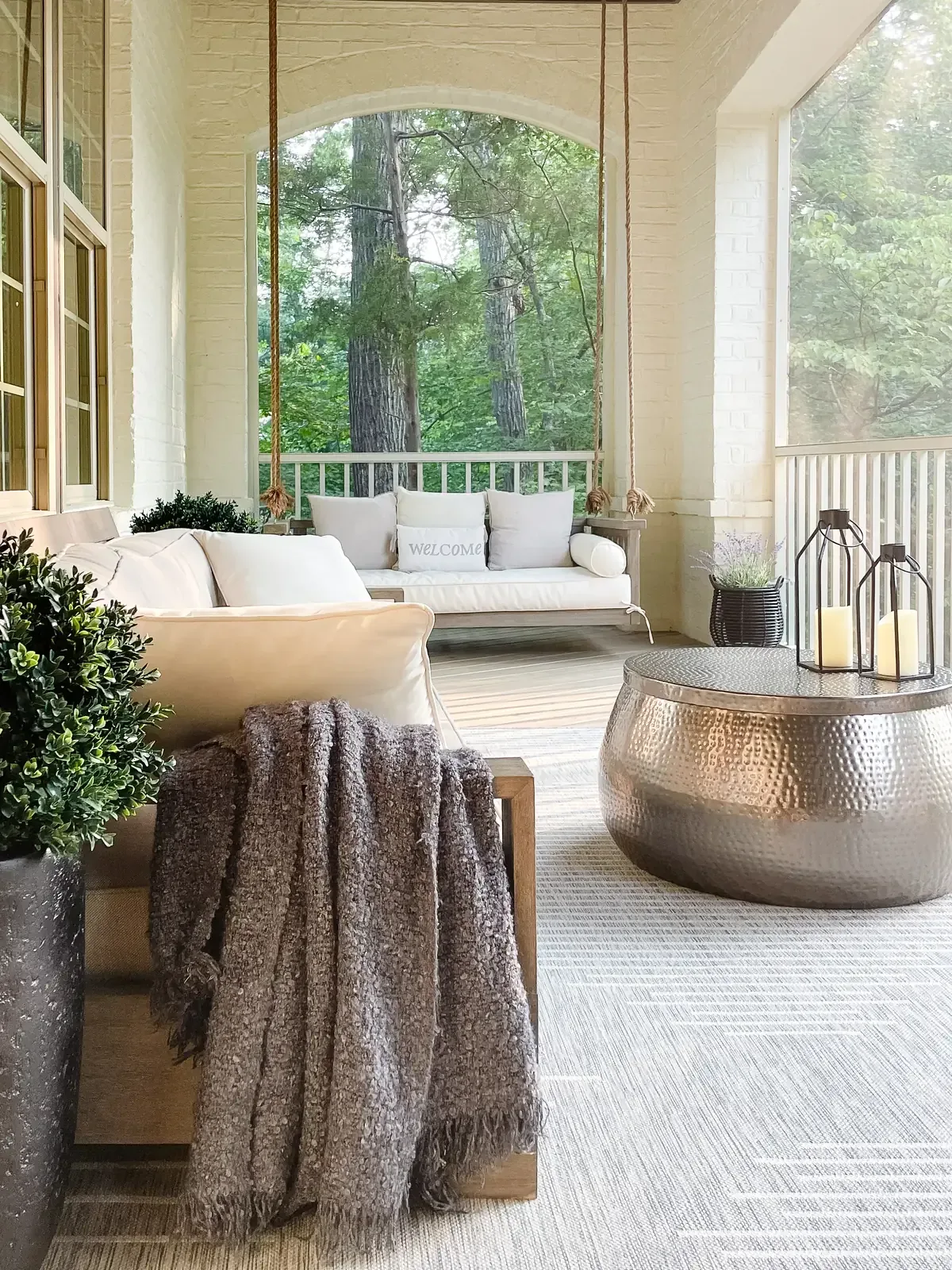 Living room with a marble fireplace and sculptural coffee table