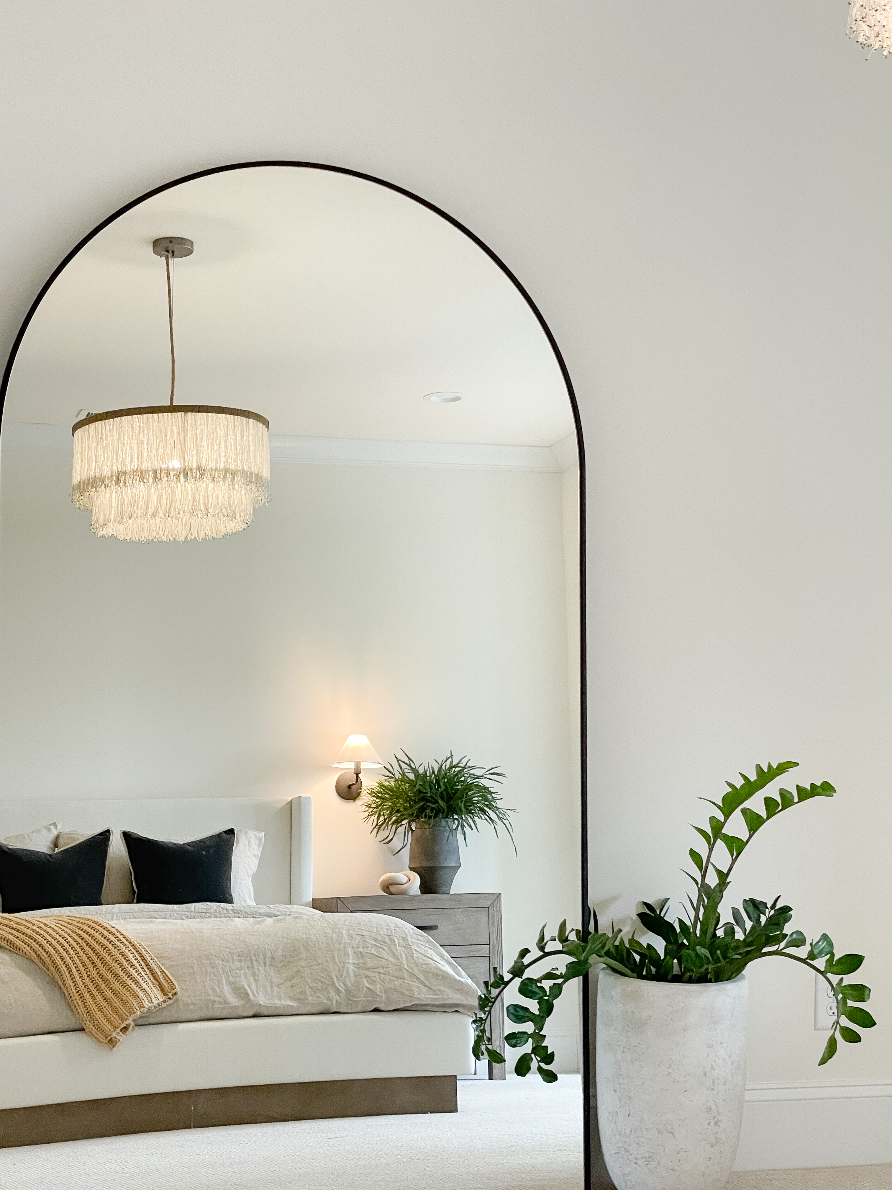arched mirror bedroom decor idea 